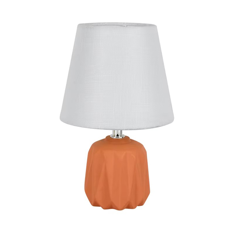 Großhandel Orange Tischlampe mit Keramiksockel und modernem Design